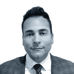 black and white headshot of Ruben Cruz, director of contracts and procurement
