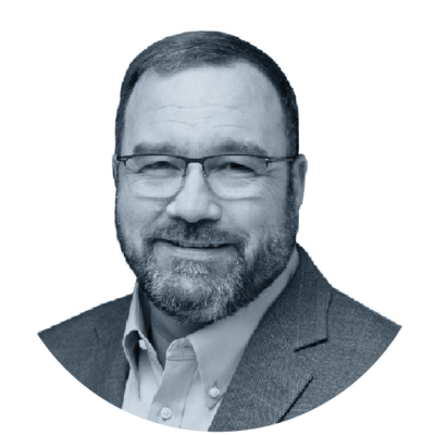 Leadership-Headshots_jack-circle-23 black and white profile image of Jack Gumtow, VP of Customer Solutions