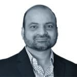 Employee_headshots-carousel-14 black and white profile image of Udaya Chundury, VP of Solutions Architecture