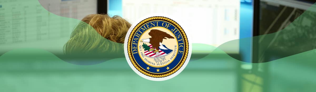 A woman working at a desk with multiple monitors displaying excel spreadsheets with the Department of Justice seal overlaid