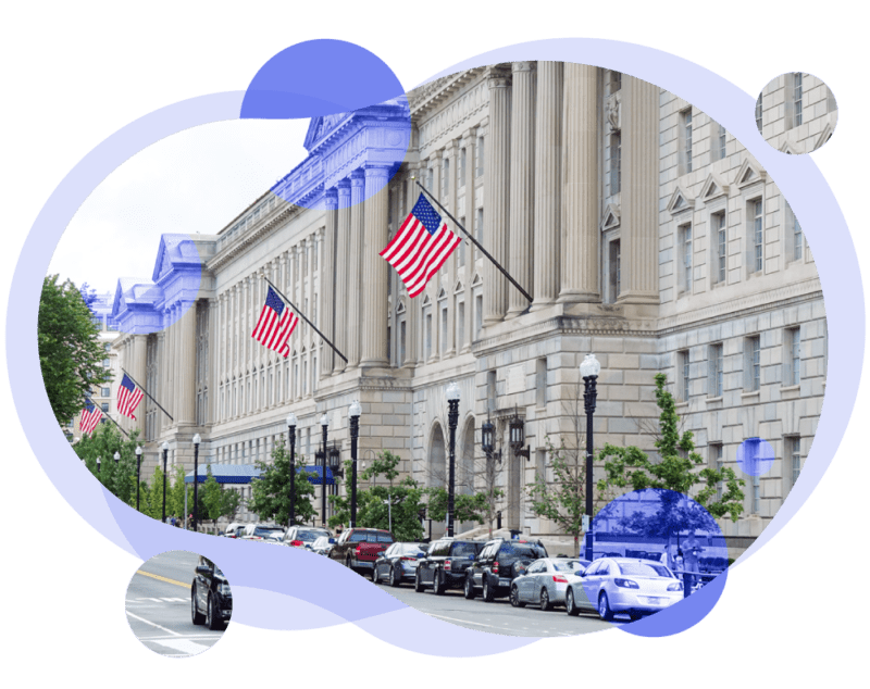 Image of government building in DC, taken at an angle showing a tree-lined street, American flags. Image cropped to an organic round shape with purple overlays