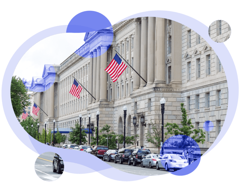 industry-NetSec Image of government building in DC, taken at an angle showing a tree-lined street, American flags. Image cropped to an organic round shape with purple overlays