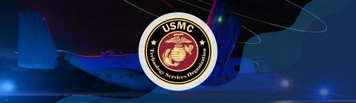 A darkened image of a USMC aircraft