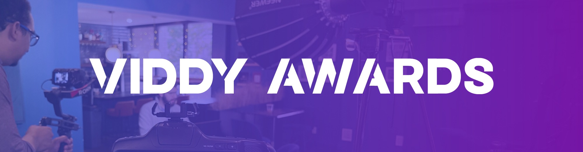 Viddy Awards logo on darkened purple background